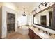A bright bathroom features double sinks, a walk-in shower, and a soaking tub at 39241 N Boulder View Dr, Scottsdale, AZ 85262