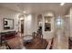 Inviting dining area with hardwood floors, arched openings, and decorative accents at 39241 N Boulder View Dr, Scottsdale, AZ 85262