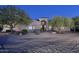 Inviting single-story home boasting neutral stucco, well-manicured landscaping, and a covered front entrance at 39241 N Boulder View Dr, Scottsdale, AZ 85262