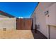 Exterior gate providing secure access to the backyard at 4080 W Goldmine Mountain Dr, San Tan Valley, AZ 85144