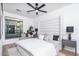 Serene bedroom with a plush bed, neutral palette, contemporary decor, and ample natural light at 4220 N 32Nd St # 31, Phoenix, AZ 85018