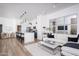 Inviting living room with an open layout, flowing into a modern kitchen featuring a marble coffee table at 4220 N 32Nd St # 31, Phoenix, AZ 85018