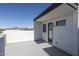 Modern patio with mountain views, featuring a sleek design with white walls and contemporary windows at 4220 N 32Nd St # 31, Phoenix, AZ 85018