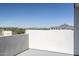 Modern outdoor patio with views of the city and mountains in the background at 4220 N 32Nd St # 31, Phoenix, AZ 85018
