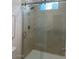 Modern bathroom featuring a glass-enclosed shower with marble-look walls and sleek hardware at 4220 N 32Nd St # 31, Phoenix, AZ 85018