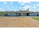 Spacious backyard featuring a grassy area and a patio, perfect for entertaining at 428 E Kachina Trl, Phoenix, AZ 85042