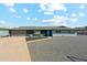 Charming home with a well-manicured yard, concrete driveway, and a gray rock garden at 428 E Kachina Trl, Phoenix, AZ 85042