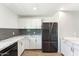 Well-appointed kitchen featuring modern stainless steel appliances and ample counter space at 428 E Kachina Trl, Phoenix, AZ 85042