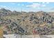 Stunning mountain views from the backyard, complete with the American flag waving at 428 E Kachina Trl, Phoenix, AZ 85042