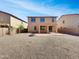 Expansive backyard complete with a covered patio and plenty of space for outdoor activities at 43530 W Eddie Way, Maricopa, AZ 85138
