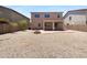 Spacious backyard with a covered patio, perfect for outdoor entertaining and relaxing at 43530 W Eddie Way, Maricopa, AZ 85138
