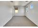 Vacant bedroom features neutral walls, plush carpeting and windows at 43530 W Eddie Way, Maricopa, AZ 85138
