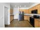 A well-lit kitchen equipped with stainless steel appliances and ample counter space at 43530 W Eddie Way, Maricopa, AZ 85138