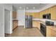 Spacious kitchen with stainless steel appliances, plentiful counter space, and ample cabinetry at 43530 W Eddie Way, Maricopa, AZ 85138