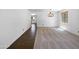 Bright and airy room with dual flooring types, ready for personalization and design at 43530 W Eddie Way, Maricopa, AZ 85138