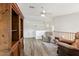 Cozy loft area with comfortable seating, wood railing, and carpeted floors offers a relaxing space at 462 W Myrtle Dr, Chandler, AZ 85248