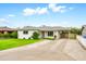 Charming single-story home with well-manicured lawn and covered carport at 508 S Pasadena --, Mesa, AZ 85210