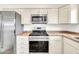 Well-equipped kitchen with stainless steel appliances and ample counter space at 508 S Pasadena --, Mesa, AZ 85210