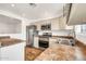 Well-lit kitchen featuring stainless steel appliances, neutral cabinetry, and ample counter space at 508 S Pasadena --, Mesa, AZ 85210