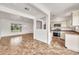 Open floor plan displaying living room, kitchen with stainless appliances at 508 S Pasadena --, Mesa, AZ 85210