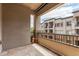 Private balcony overlooking the complex showcasing tiled flooring, sturdy railings, and architectural design at 5350 E Deer Valley Dr # 3274, Phoenix, AZ 85054