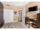 Comfortable bedroom offering a desk, a closet, and natural lighting at 5350 E Deer Valley Dr # 3274, Phoenix, AZ 85054