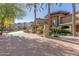 Upscale apartment complex featuring palm trees, manicured landscaping, and decorative stonework for enhanced curb appeal at 5350 E Deer Valley Dr # 3274, Phoenix, AZ 85054