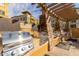 Modern outdoor grilling station with stainless steel grills, stone columns, and overhead pergola at 5350 E Deer Valley Dr # 3274, Phoenix, AZ 85054