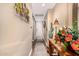 Tastefully decorated hallway entrance featuring flowers and rustic wooden table at 5350 E Deer Valley Dr # 3274, Phoenix, AZ 85054