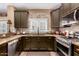 Well-equipped kitchen with modern stainless steel appliances at 5350 E Deer Valley Dr # 3274, Phoenix, AZ 85054