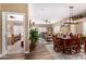 Open-concept living room with hardwood floors, plush seating, and abundant natural light at 5350 E Deer Valley Dr # 3274, Phoenix, AZ 85054