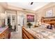 Comfortable main bedroom with access to the ensuite bathroom, carpet floors, and light walls at 5350 E Deer Valley Dr # 3274, Phoenix, AZ 85054