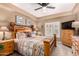 Cozy main bedroom with carpet floors, light walls, and natural lighting at 5350 E Deer Valley Dr # 3274, Phoenix, AZ 85054