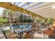 Comfortable outdoor seating area with lounge chairs and glass railings overlooking the pool and community at 5350 E Deer Valley Dr # 3274, Phoenix, AZ 85054