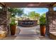 Relaxing water feature with stone accents, lush landscaping, and walkway at 5350 E Deer Valley Dr # 3274, Phoenix, AZ 85054