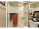 Bathroom featuring a glass shower and decorative accessories at 6031 N Milano Ct, Litchfield Park, AZ 85340