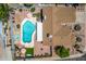 Aerial view of the backyard with pool, hot tub, seating areas and desert landscaping at 6156 W Del Rio St, Chandler, AZ 85226