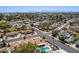 This is an aerial view of a neighborhood, highlighting mature trees, houses, and street layout at 6156 W Del Rio St, Chandler, AZ 85226