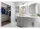 Elegant bathroom with double vanity and walk-in closet at 6156 W Del Rio St, Chandler, AZ 85226
