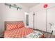This cozy bedroom has a large closet, laminate floors and access to the en suite at 6156 W Del Rio St, Chandler, AZ 85226