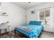 Cozy bedroom features a bright window, wood floors, and a comfortable atmosphere at 6156 W Del Rio St, Chandler, AZ 85226