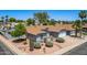 Well-manicured front yard with desert landscaping, mature shade trees, and a charming single-story home at 6156 W Del Rio St, Chandler, AZ 85226