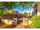 Landscaped backyard showcasing a stone columned walkway and block wall fencing at 6286 S Reseda St, Gilbert, AZ 85298