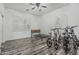 Spacious bedroom features wood floors, ample natural light, and modern window shutters at 6286 S Reseda St, Gilbert, AZ 85298