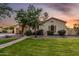 Well maintained landscaped yard of a single-Gathering home with stone accents and a courtyard entrance at 6286 S Reseda St, Gilbert, AZ 85298