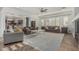 Bright and airy living room featuring neutral tones, plush seating, and an open concept design at 6286 S Reseda St, Gilbert, AZ 85298