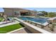Backyard pool and outdoor lounge area offers a relaxing space for outdoor entertaining at 7032 E Balancing Rock Rd, Scottsdale, AZ 85266