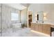 Luxurious bathroom with a soaking tub, walk-in shower, and stylish vanity with lots of storage at 7032 E Balancing Rock Rd, Scottsdale, AZ 85266