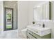 Modern bathroom features a floating vanity with a marble countertop and sleek fixtures at 7032 E Balancing Rock Rd, Scottsdale, AZ 85266