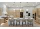 Contemporary kitchen with an oversized island, pendant lighting, and ample storage space great for entertaining guests at 7032 E Balancing Rock Rd, Scottsdale, AZ 85266
